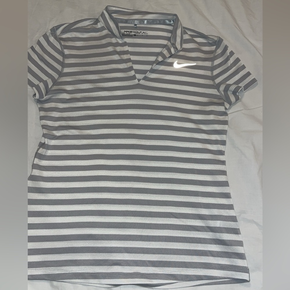 Women's Nike Golf Polo - size small. Stretchy, soft, and breathable!